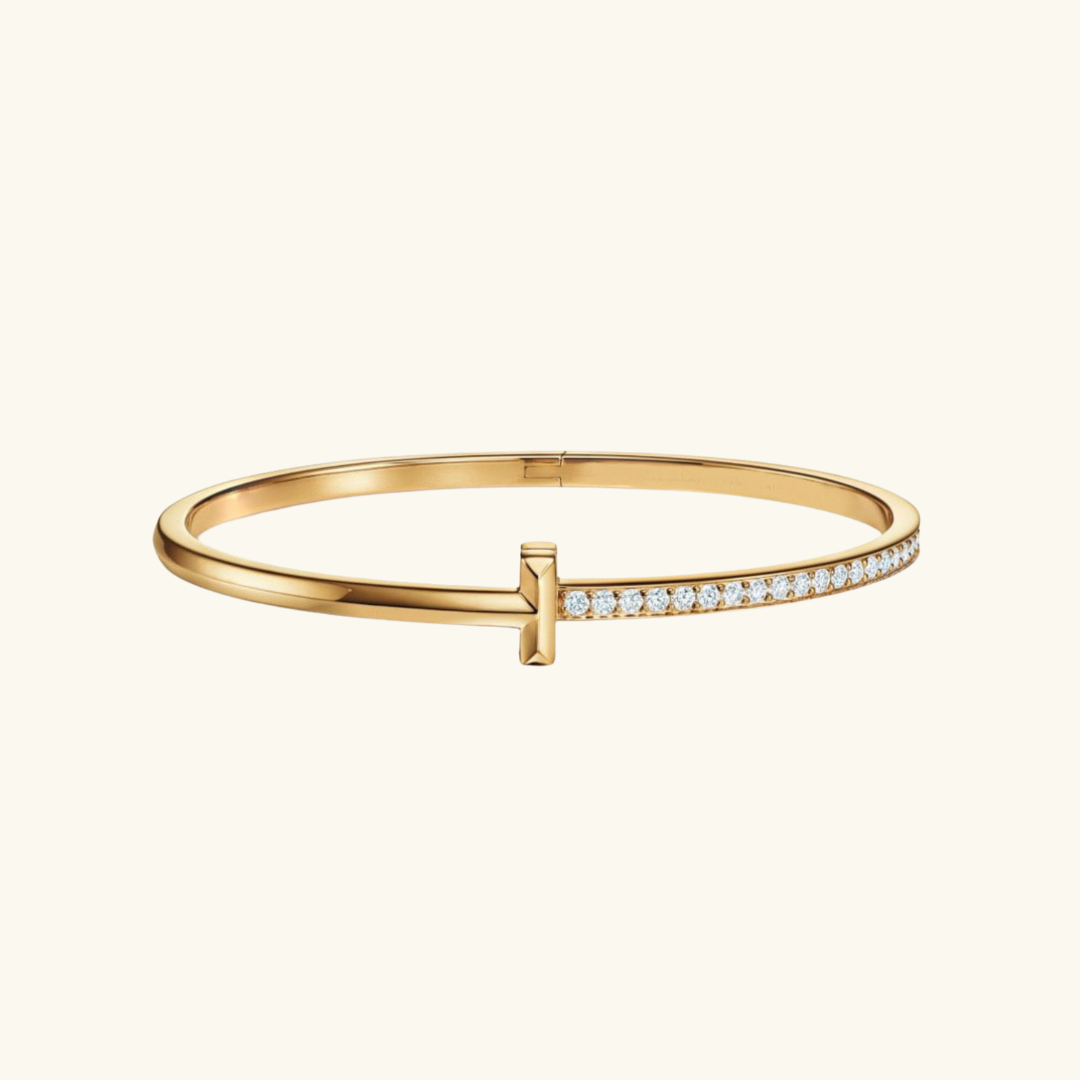T DIAMOND HINGED BANGLE (18K YELLOW GOLD)